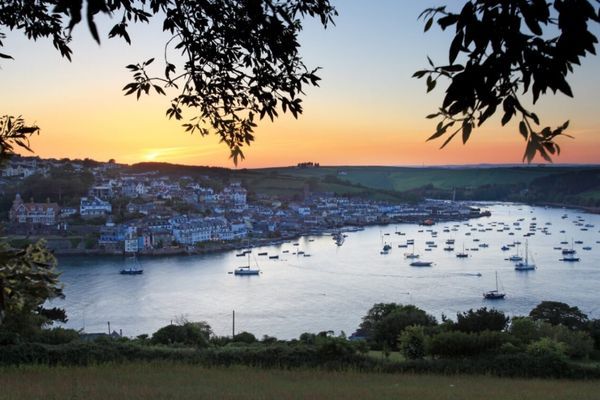 Sunset over a South Devon estuary town